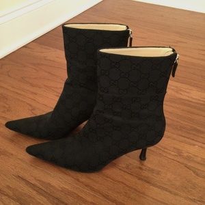Authentic Gucci monogram black pointed toed size 8.5 boots.